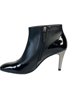 🛍️ Giuseppe Zanotti Black Leather Ankle Booties with Sculpted Heel